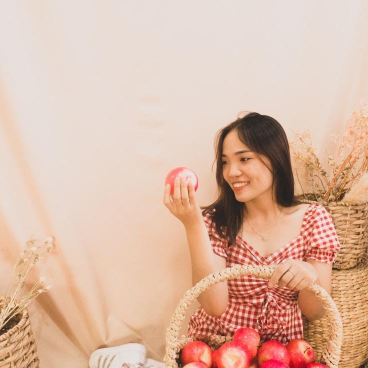 Nova Patel, Lead Design Curator at Ever Field Systems, reviewing corporate floral arrangements